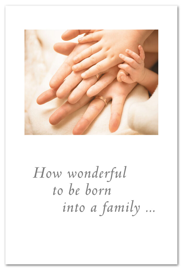 Family hands new child card.